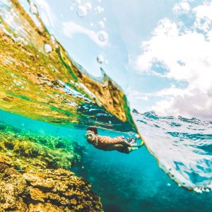 Man swims in the sea with his tungsten ring