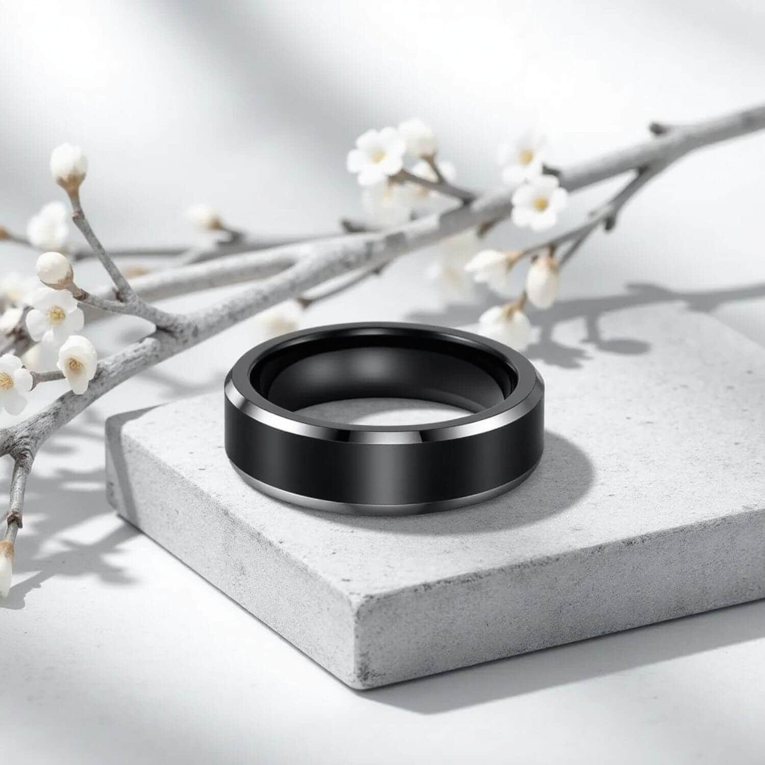 A stunning ring for men. Made with titanium this mens ring is well suited as both a male wedding ring, engagement ring, or as a fashion statement ring for him