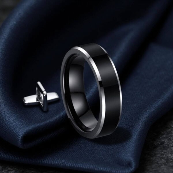 Male statement ring. This black and silver titanium ring will add style to every outfit. Lightweight.