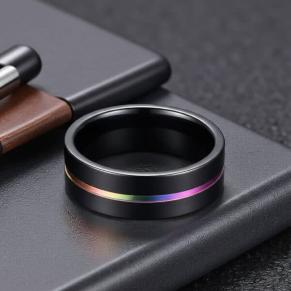Black and rainbow gents titanium ring – male wedding and engagement band with custom engraving.