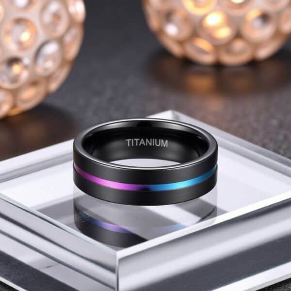 Mans titanium ring - black band with centre groove of iridescent rainbow