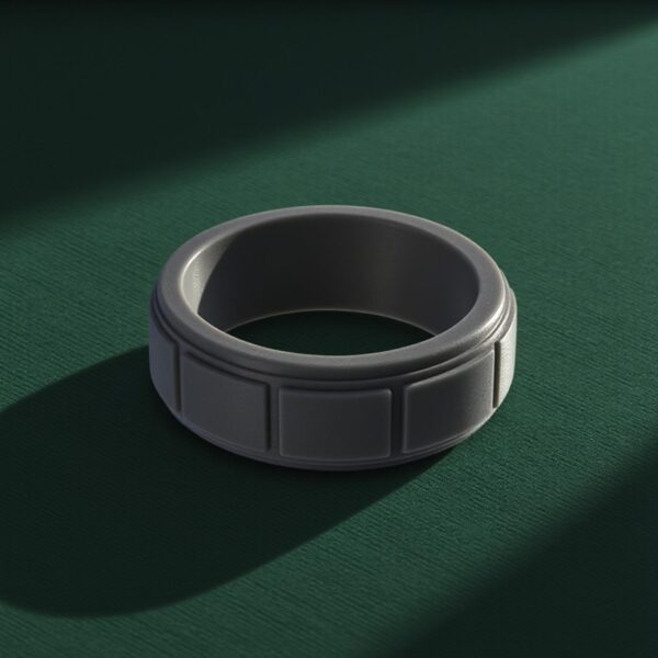 Contemporary silicone ring for him in charcoal grey with block pattern. Suitable as a male engagement ring, gents eternity ring, or flexible stretchy band.