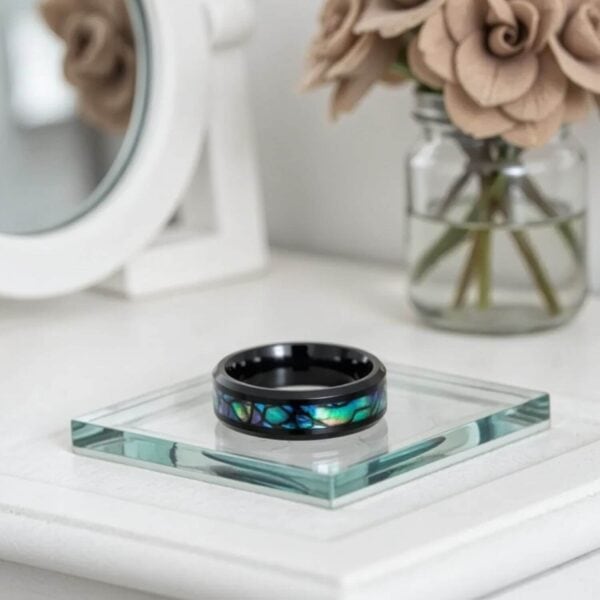 Men's black titanium ring with abalone shell inlay