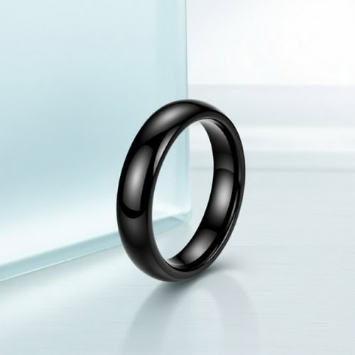 A lightweight yet durable men’s titanium ring, finished in polished black and suited to a male wedding band or everyday fashion statement ring.