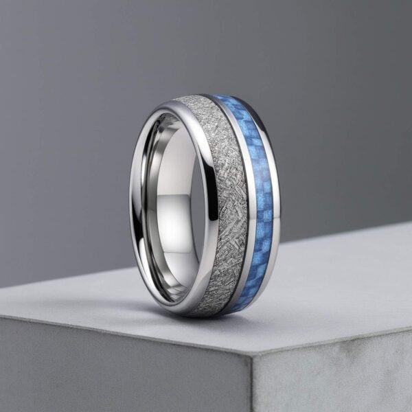 Tungsten ring for men with blue carbon fibre and meteorite inlay, statement wedding band with personalised engraving.