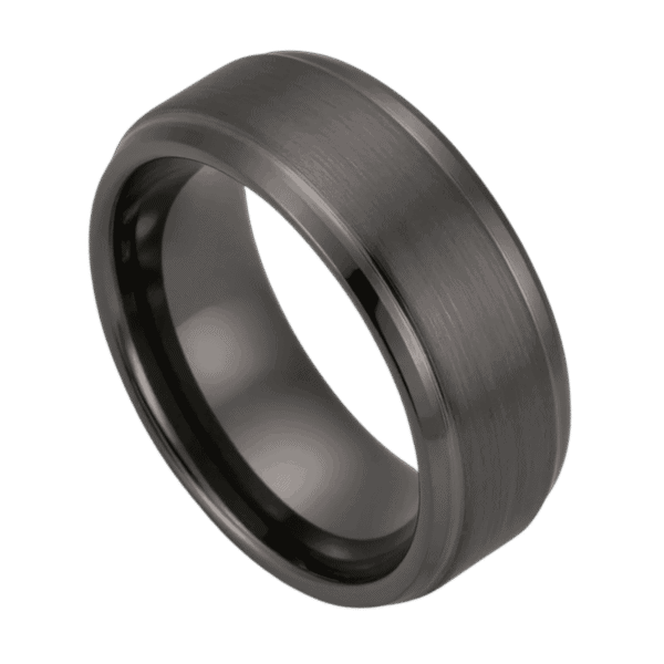 A zoomed in shot of a mens gunmetal grey tungsten ring. With a slightly raised centre section which has a brushed finish. And polished stepped edges.