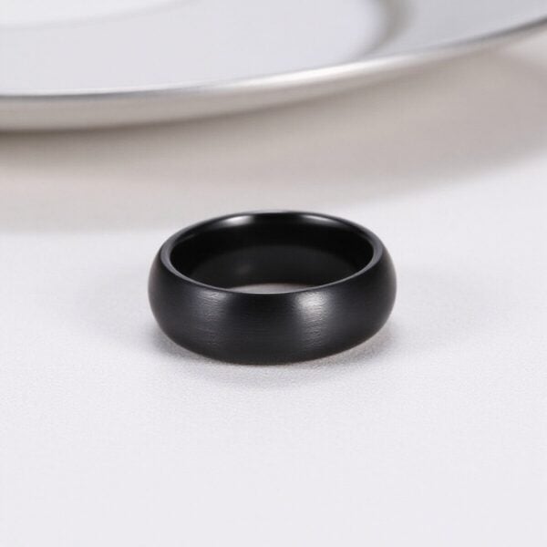 The Panther brushed black ceramic men’s ring — modern domed wedding band or engagement ring for guys.