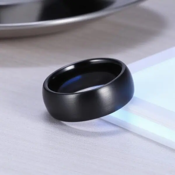 Men’s black ceramic ring — The Panther stylish eternity band with custom ring engraving for him.