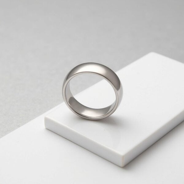 An elegant white gold tungsten ring for men. Perfectly suited as a mans fashion statement ring.