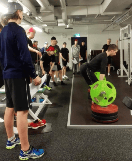 Going over proper setup on block pulls with the U17 team