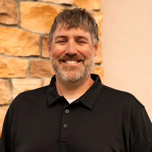Smiling male physical therapist at North Platte Physical Therapy clinic.