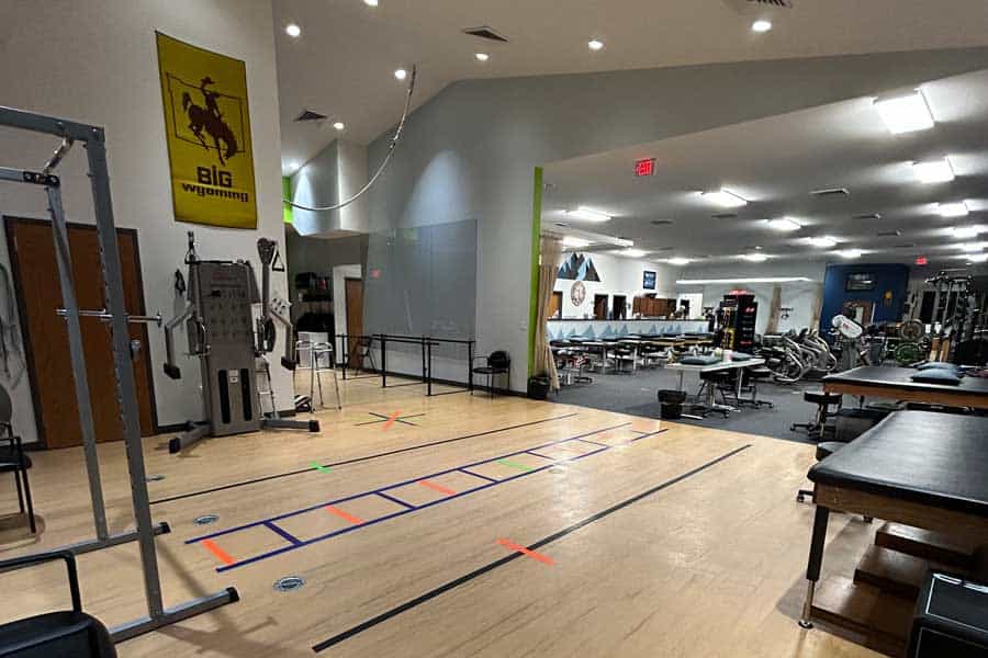Interior view of North Platte Physical Therapy with gym equipment and therapy space.