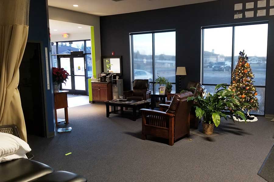 Comfortable waiting area at North Platte Physical Therapy with Christmas decor.