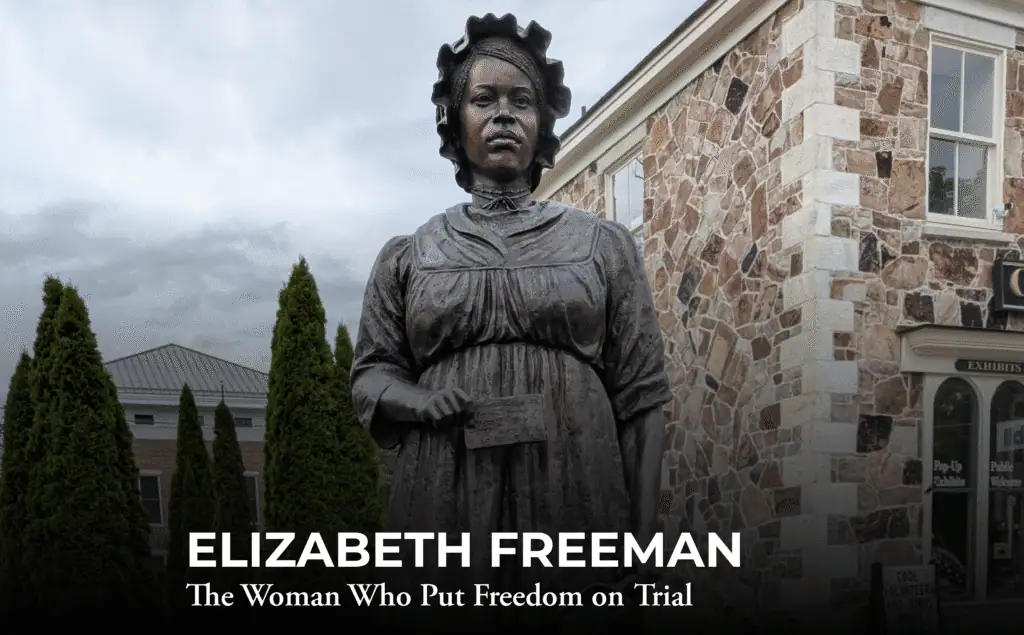 A bronze statue of Elizabeth Freeman stands in front of a stone building and tall trees, near where Henry Knox once walked. Text at the bottom reads: "Elizabeth Freeman: The Woman Who Put Freedom on Trial.
