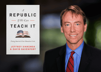 The image shows the book cover of "A Republic If We Can Teach It" by Jeffrey Sikkenga & David Davenport next to a smiling man in a suit and red tie, standing against a blurred background.