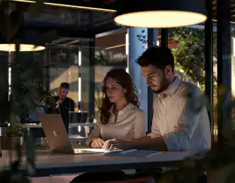 Digital agency team working late on web design strategy to elevate UK brand presence