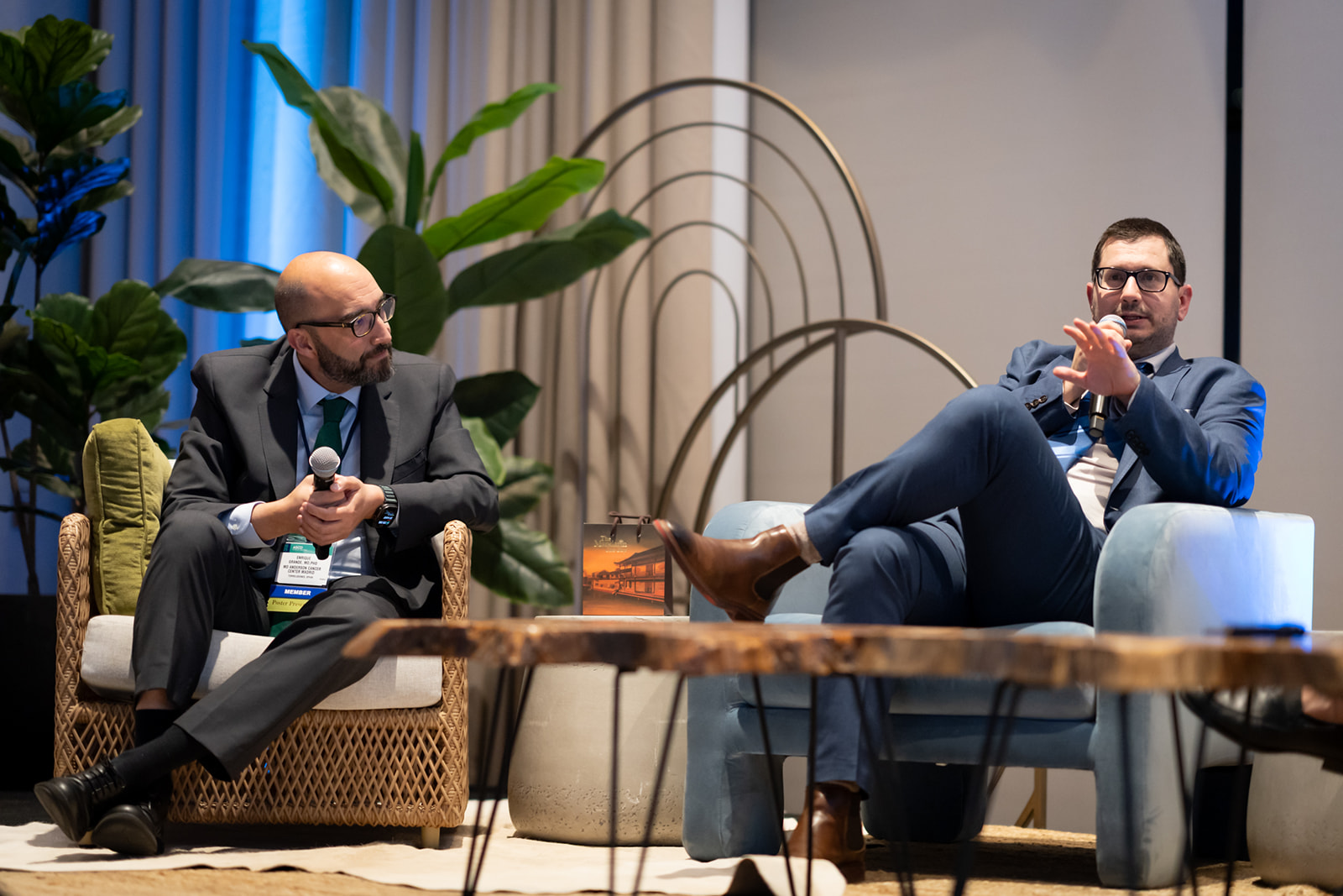 OncUpdates conference panel discussion featuring medical professionals discussing oncology advancements and cancer treatment strategies at a professional medical event.