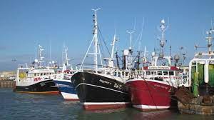 Fishing boats moorings Image of several fishing boats moored at port in a small fishing village