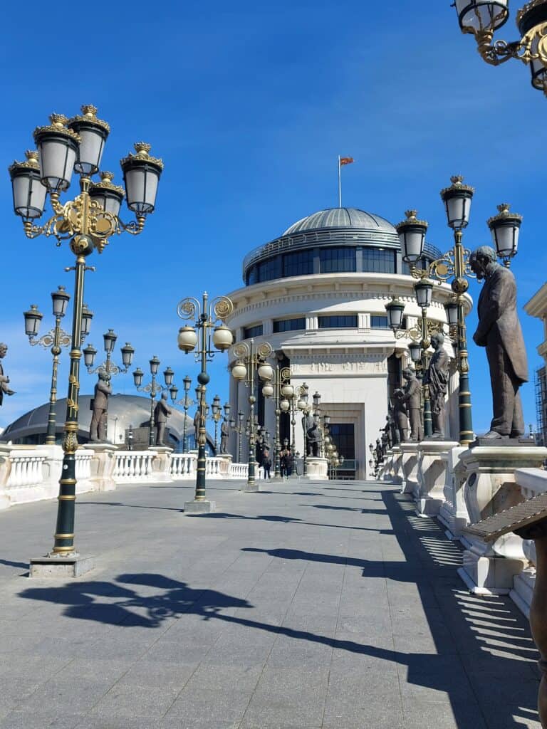 Bridge of Civilisation Skopje with many statues leading to the Archeological museum of North Macedonia