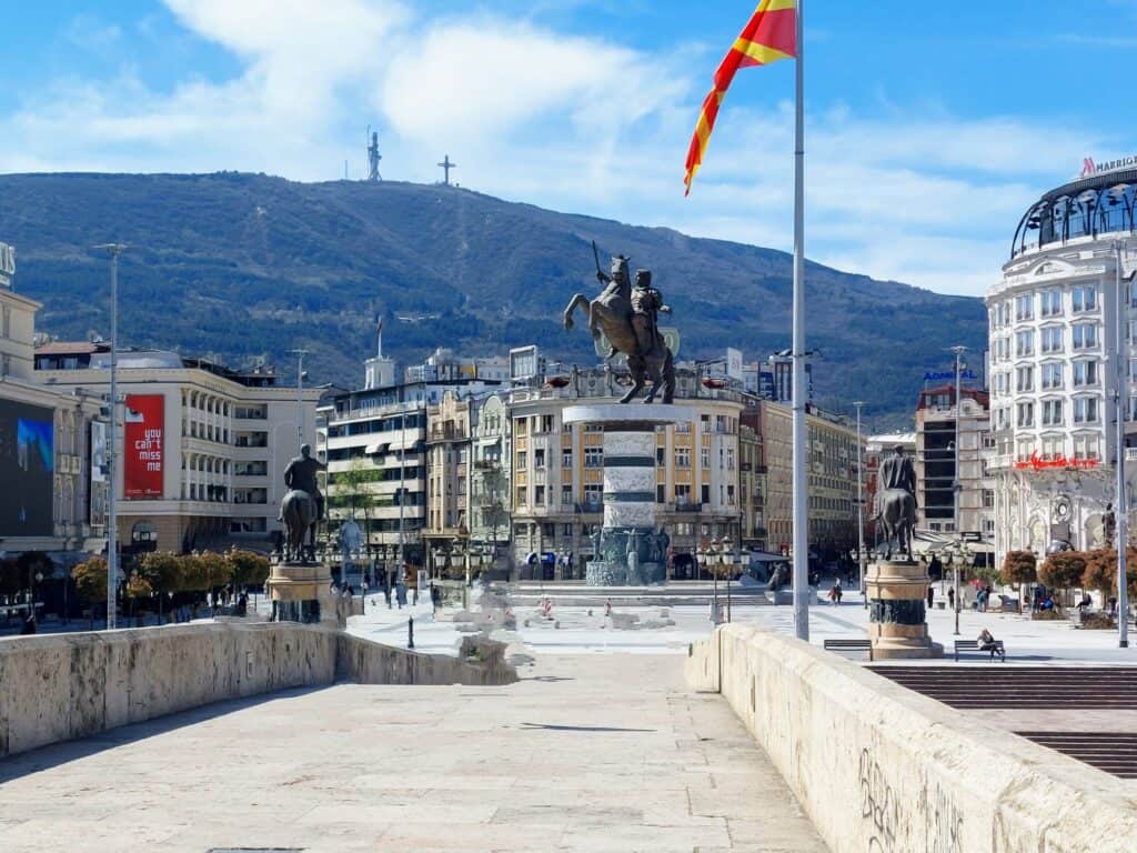 central square with mount vodno in the back and the millenium cross. Skopje. North Macedonia