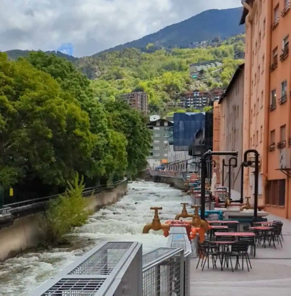 View from Pont d'Engordany including outdoor dining and large tap sculpture