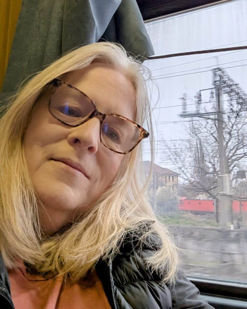 Christine Author of One Small Bag arriving in Bucharest after a night on the sleeper train from Chisinau