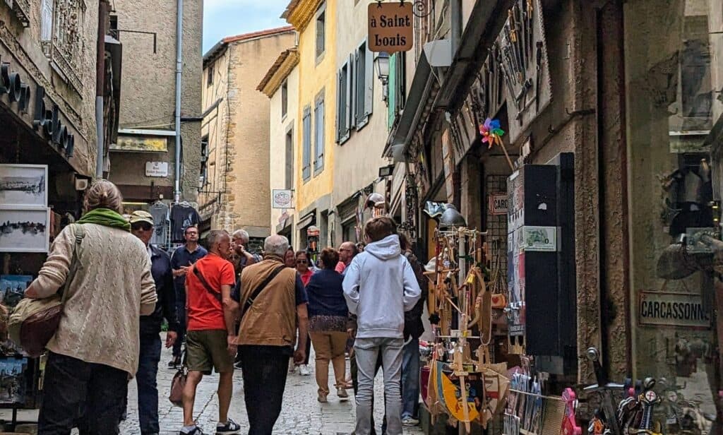 Cobblestone streets shops in carcassonne medieval city
