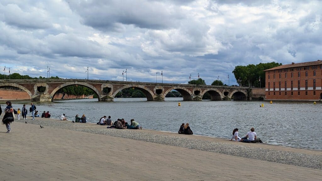 The Garonne River with a view towards the Pont Neuf in Toulouse