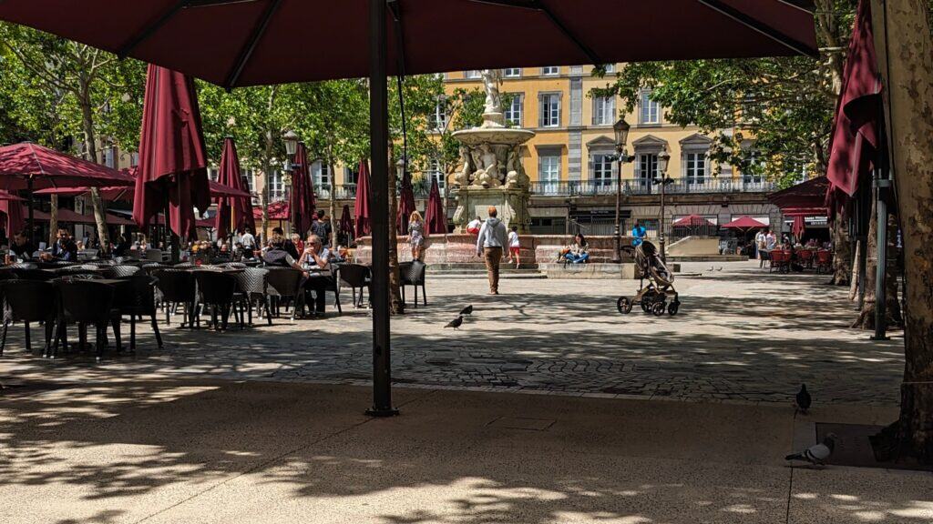 Place carnot ville basse carcassonne. Cafe lined streets, fountain with dolphins and rose coloured base