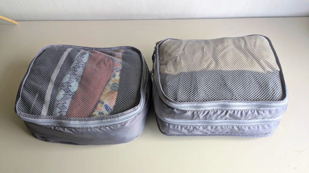 muji 2 small packing cubes - ziped up - one single, one double - fits 4 season clothes in 24L backpack - Fjallraven Highcoast Foldsack 24L