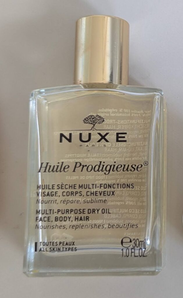 Nuxe Hair face and body dry oil, minimalist toiletries, carry-on toiletries