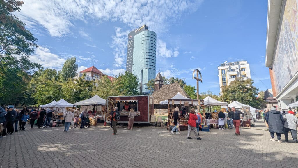 Market behind the museum of peasant life - Bucharest - with wooden church in the middle