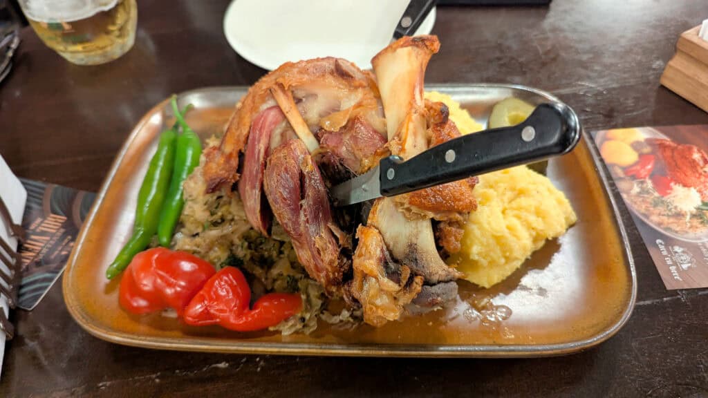 Pork knuckle to share - with Polenta - Caru Cu Bere - Bucharest