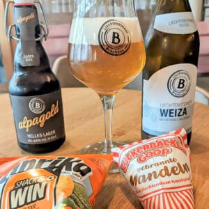 supper at the youth hostel Vaduz Liechtenstein - pistachios, crisps and beer