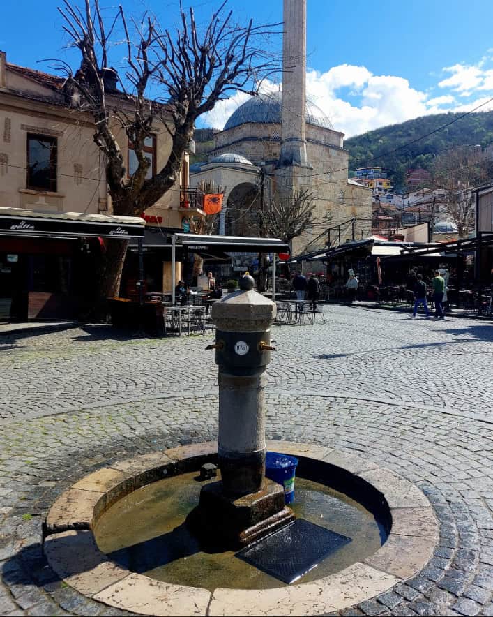Old marble fountain in the centre of Shadervan Square Prizren Kosovo