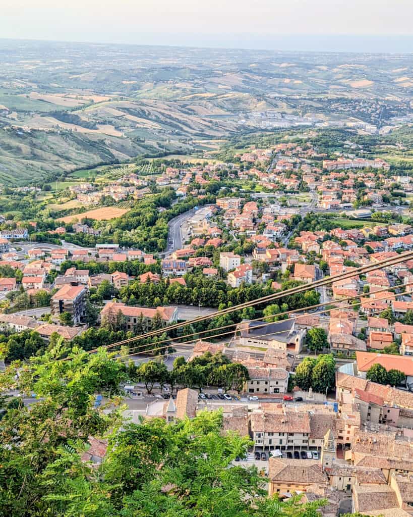 View across the rolling hills of Emilia-Romagna to the Adriatic from the cable car at San Marino