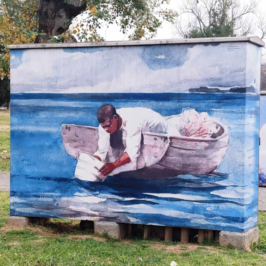public art new waterfront thessaloniki man with a bucket in the sea