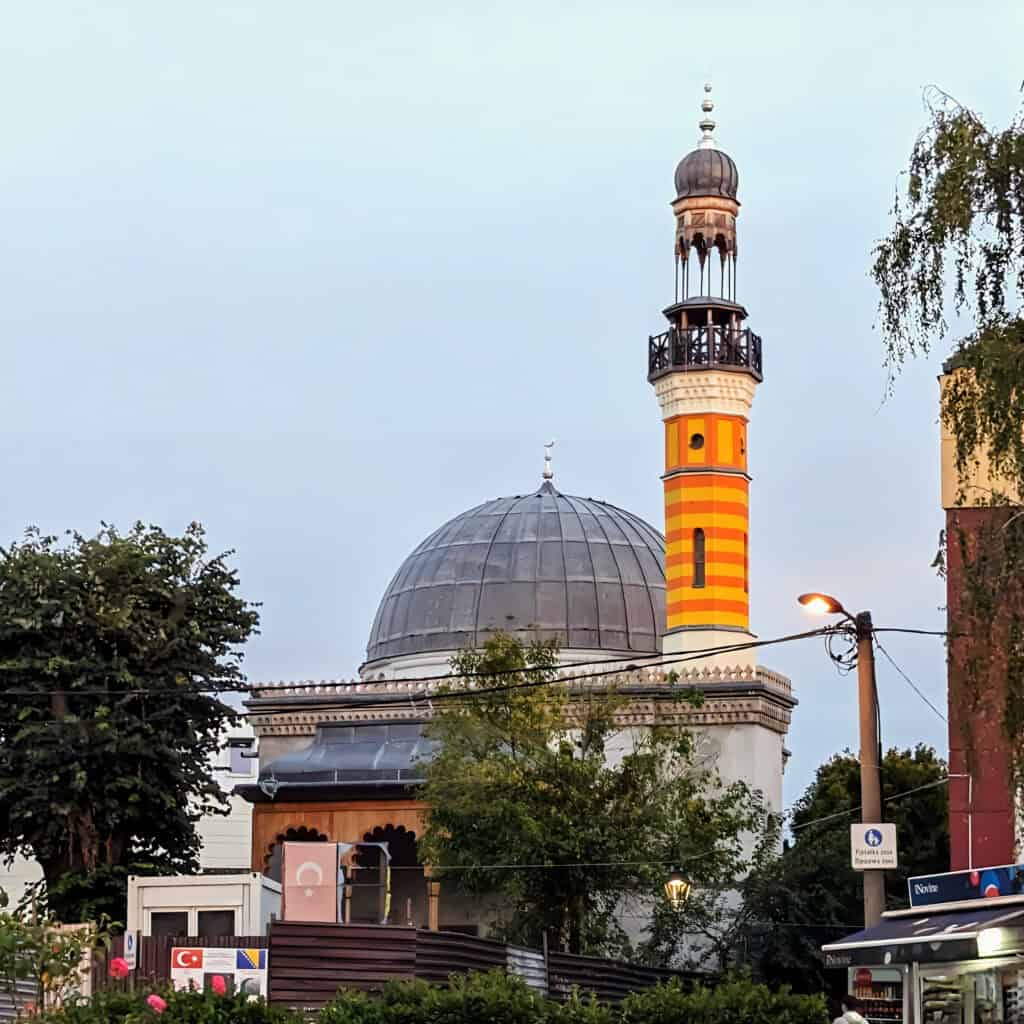 The mosque: Šarena džamija (The Colourful Mosque) in Tuzla Bosnia Herzogovina - outside - view of stripey tower