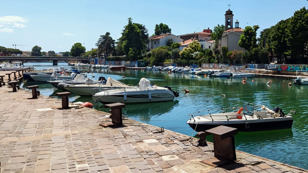 river scene with boats in Rimini