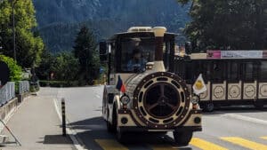 Tourist Train in Liechtenstein travelling through the mountains around Vaduz