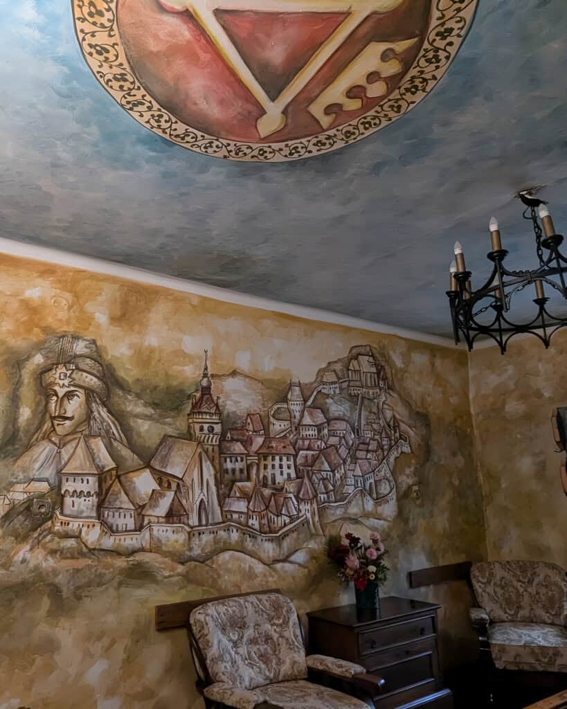 Inside Vlads House Sighisoara Transylvania Picture of Vlad painted on the wall