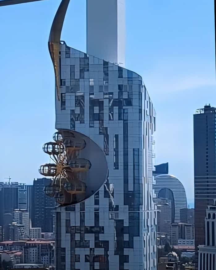 Butami Tower with Ferris Wheel on the side - view from Alphabetic tower glass lift