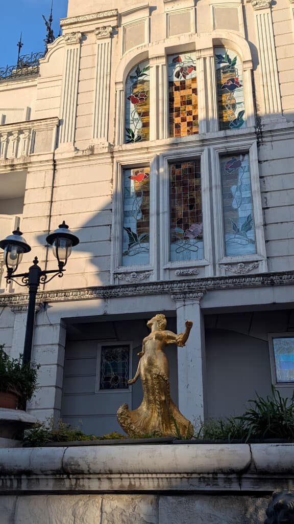 Golden Woman statue infront of Oleg Galogre Boutique Hotel - Batumi Piazza