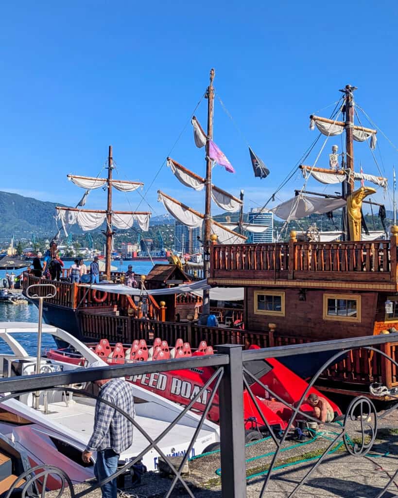 pleasure boats including pirate ships in the harbour at Batumi