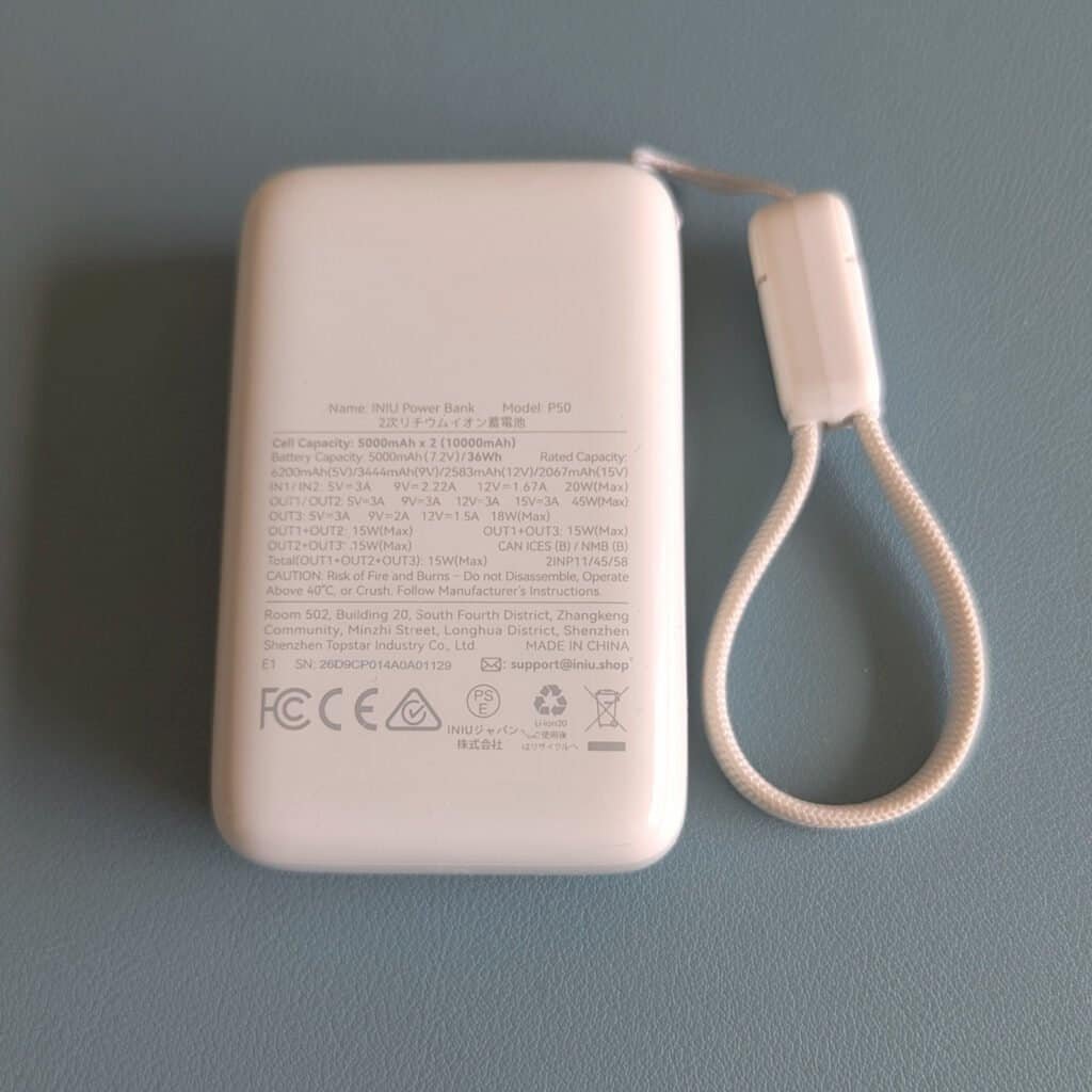 Reverse of Iniu P50 Powerbank with symbols and technical information
