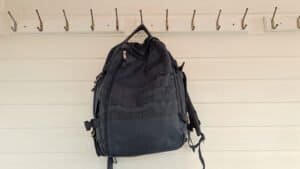 One Small Bag hanging up - 28L Cabin Zero Military - Underseat Bag - Personal Item sized bag
