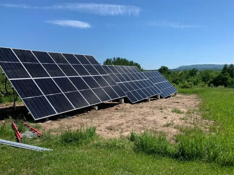 Commercial solar panel installation answering Solar Energy FAQs