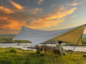 camping tarp outdoors sunset