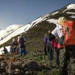 a group hike on a mountain range