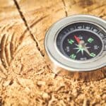 a compass on flat surface